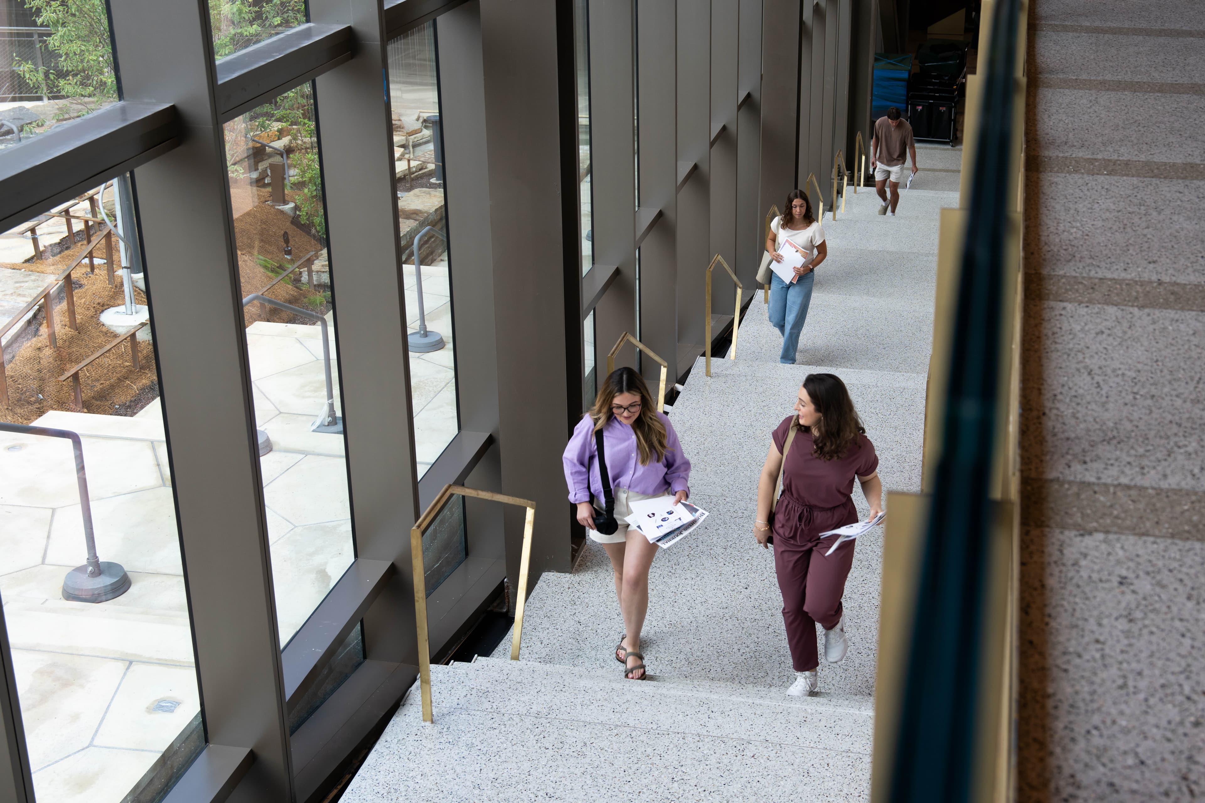 Students walking up stairs