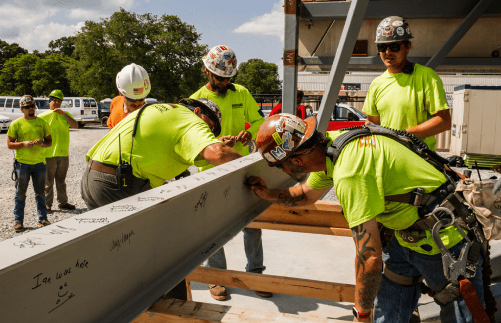 Crossland Construction Company team signing last steel beam